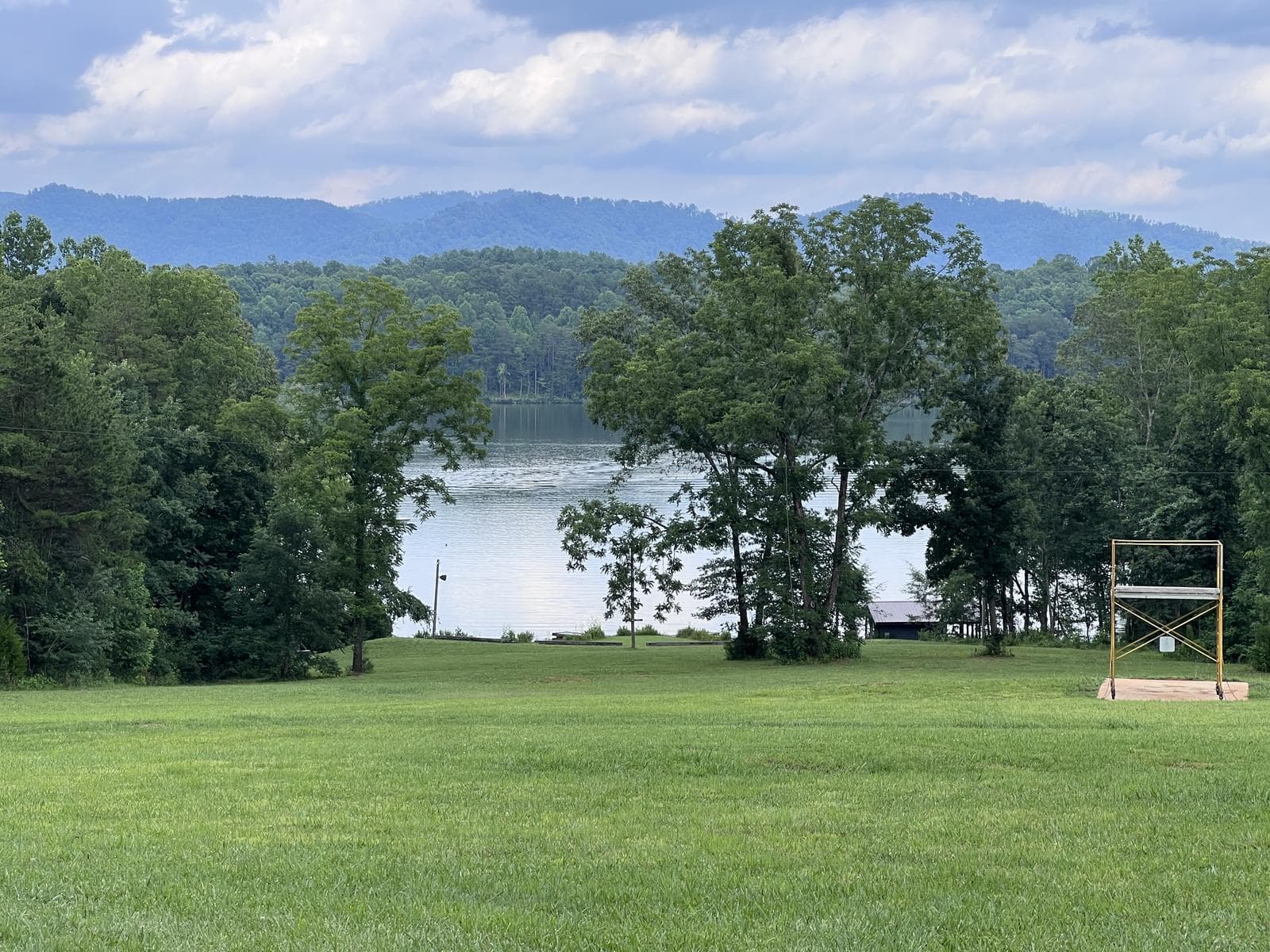A lake and mountain view from a troop campout