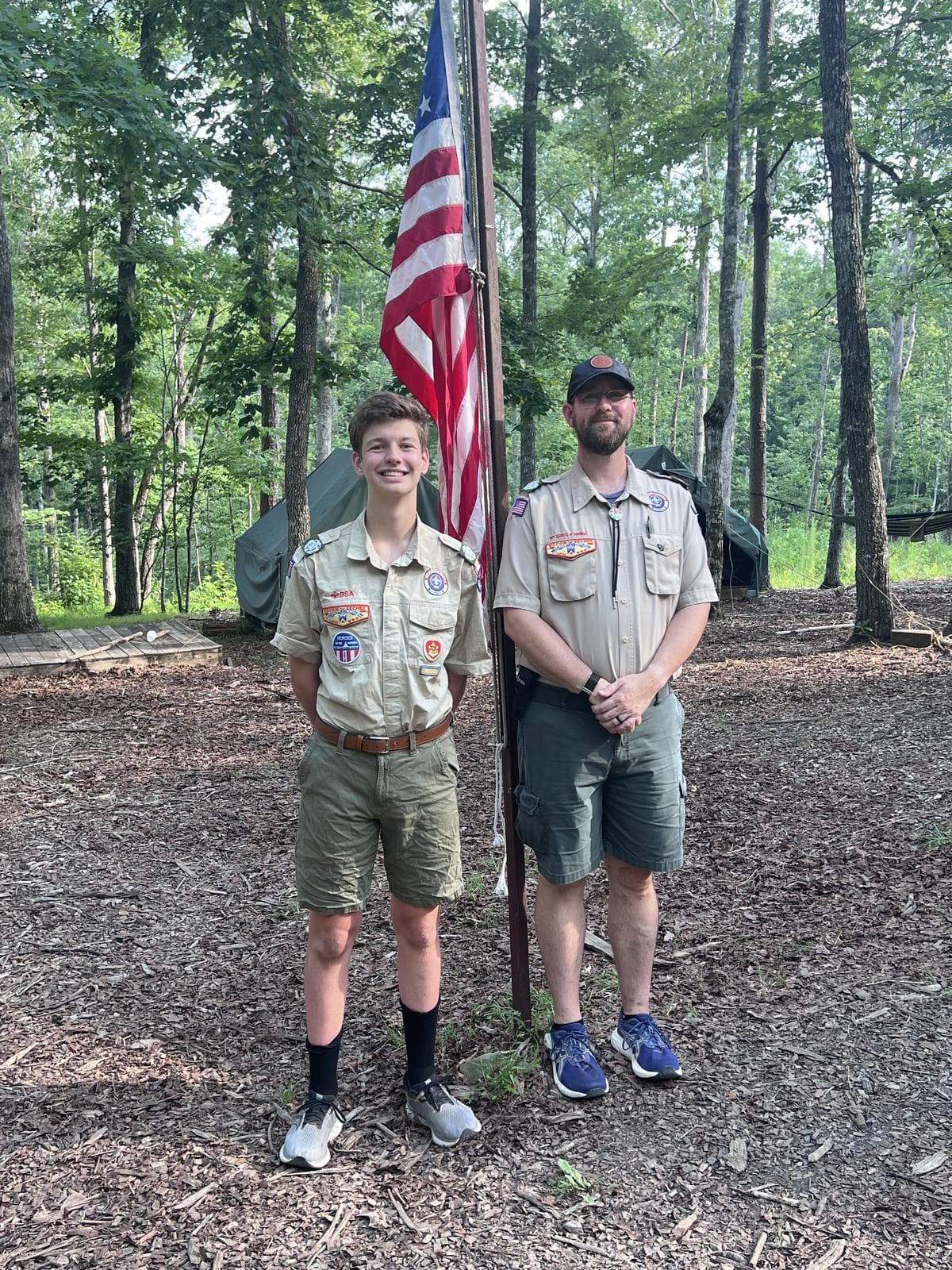 The author with his son at a troop campout, both in Scout uniform